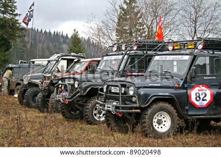 MINYAR, RUSSIA - OCTOBER 31: Competitors\' off-road vehicles UAZ take part at the annual trophy challenge \