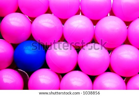 Blue ball amongst pink balls