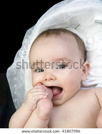 Infant with Foot in Mouth