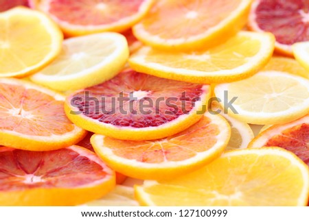 Beautiful background made of colorful citrus fruit slices