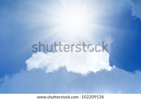 Peaceful background - bright sun shines from above, blue sky, white clouds - heaven