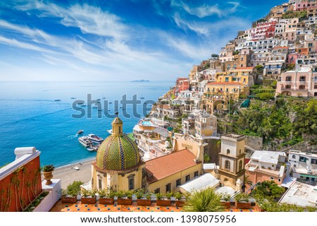 Beautiful Positano on hills leading down to coast, comfortable beaches and azure sea on Amalfi Coast in Campania, Italy. Amalfi coast is popular travel and holyday destination in Europe. Foto d'archivio © 