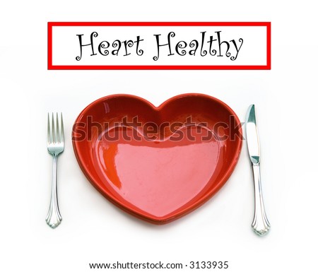 A heart health concept - isolated on white - red heart plate, knife and fork with text graphic.