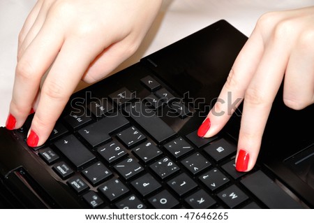 Ctrl alt delete, Close-up of female fingers typing a document on the black laptop