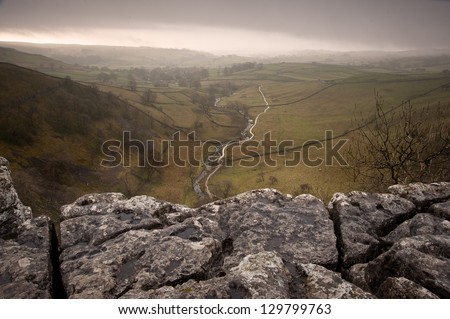 Limestone pavement overlooking Malham Beck and Dale in Yorkshire Dales National Park