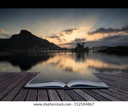 Creative concept pages of book Beautiful sunrise mountain landscape reflected in calm lake