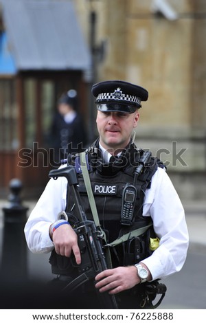 LONDON - APRIL 29 - Armed Police make their presence obvious during the Royal Wedding of Prince William and Kate Middleton April 29, 2011 at Westminster Abbey in London, England.