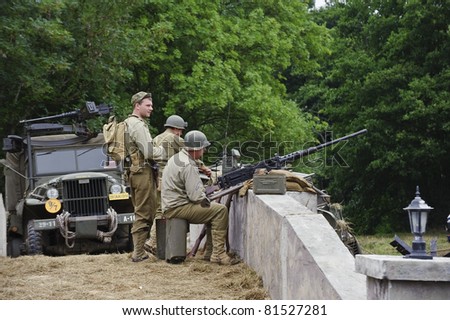 LONDON - JULY 21 - Unidentified members of the public reenact WW2 during War and Peace Show, the world\'s largest military show,  on July 21st, 2011 near London, England