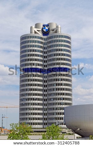 MUNICH, GERMANY - 4 AUGUST 2015: Opened in 1973, the BMW four cylinder tower (BMW Hochhaus Vierzylinder) is the world headquarters of German auto maker BMW.