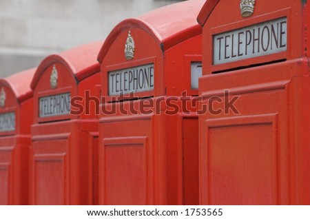 Four red London telephone boxes