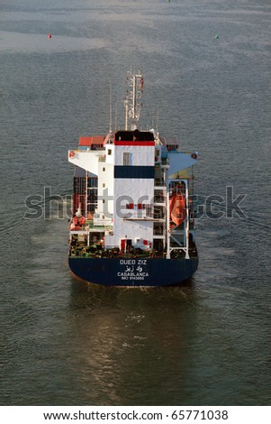 VARNA, BULGARIA - NOVEMBER 18: Moroccan cargo ship OUED ZIZ (Year Built: 1998, DeadWeight: 7600 t) sails into Port of Varna-West on November 18, 2010 in Varna, Bulgaria.