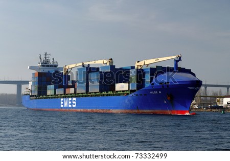 VARNA, BULGARIA-MAR 14: Turkish cargo ship HILDE A (Year Built: 2005, Dead Weight: 22033 t) sails away into open sea after a short stay in Varna-west port on March 14, 2011 in Varna, Bulgaria