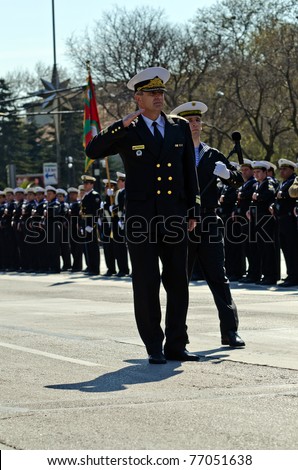 VARNA, BULGARIA - MAY 6: Commodore Emil Eftimov salutes the military parade participants on May 6, 2011 in Varna, Bulgaria. The parade is held to celebrate May 6, the Day of the Bulgarian Army.