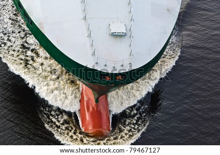 VARNA, BULGARIA-MAY 13: Cargo ship ERNST RICKMERS (Year Built: 2000, Flag: Marshall Is) sails away into open sea after a short stay in Varna-west port on May 13, 2011 in Varna, Bulgaria.