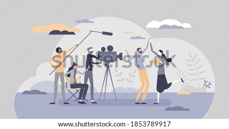 Movie making industry and cinematography filming process tiny person concept. Director, actors, producer and cameraman as creative motion pictures team vector illustration. Hollywood lifestyle scene.