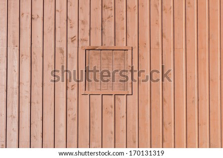 Detail of vintage barn: Boarded window of timber frame barn built in the 1890s and now maintained as part of an historic farm for public education in Will County, Illinois, USA