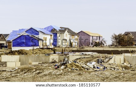 WASHINGTON, ILLINOIS, USA - MARCH 31, 2014: In the aftermath of a tornado last November, repair and reconstruction go on in neighborhoods reminded every day of nature\'s sometimes violent whims.