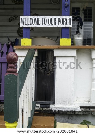 Sociable sign on front porch of house on a rainy day in Florida: \