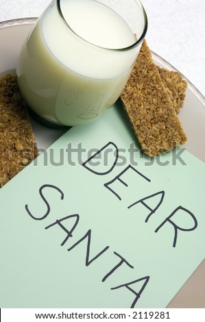 Glass of milk, three granola bars, and note to Santa Claus on dinner plate