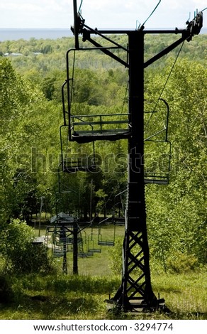 Sky lift pylons on hillside in late spring, northern Wisconsin