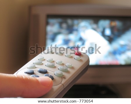 stock-photo-close-up-of-tv-remote-control-with-sport-on-tv-in-the-background-773054.jpg