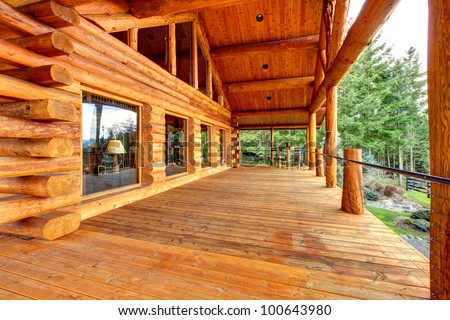Wood log cabinet porch exterior.