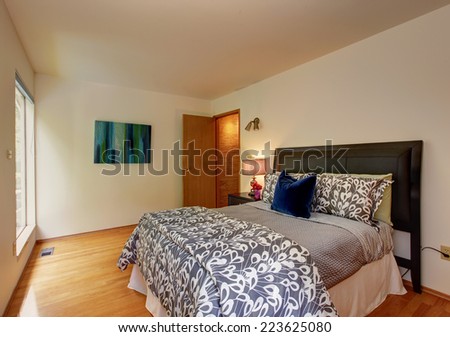 Bedroom furniture with mocha tone bedding