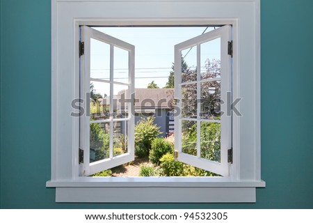 Similar – Foto Bild Ein kleines Fenster mit Gardiene in einer mit wildem Wein bewachsenen Mauer im Winter