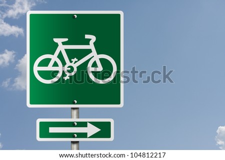 An American road sign with a sky background and bike symbol, Bike Route this way