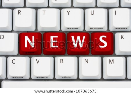 A computer keyboard with red keys spelling news, Getting your news on the internet
