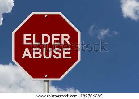 Stop Elder Abuse Sign, An American road stop sign with words Elder Abuse with blue sky background