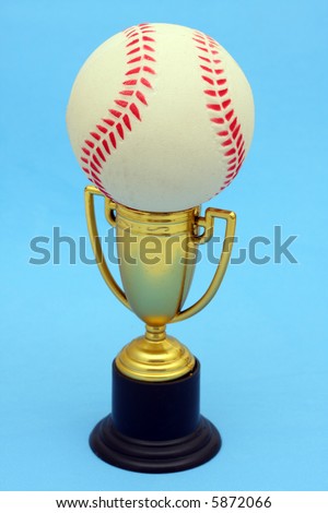 Gold trophy with black bottom holding a baseball on a blue background