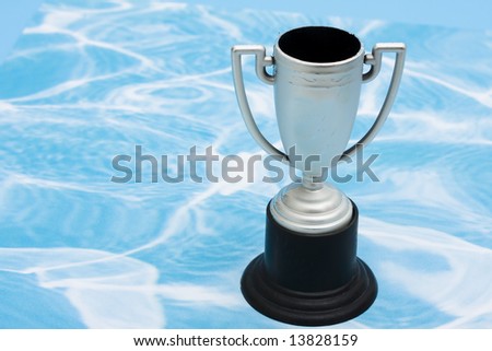 Trophy on blue and white swirl background