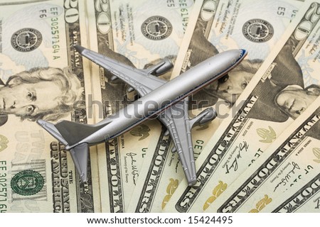 Airplane on Money, the rising costs of airline travel