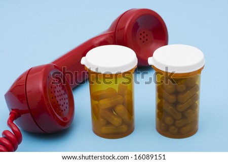 Prescription bottles with telephone,help with your medications