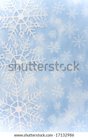 Blue background with close up of snowflake making a border, snowflake border Christmas xmas