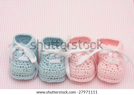 Blue And Pink Baby Booties On A Pink Background, Baby Booties Stock ...