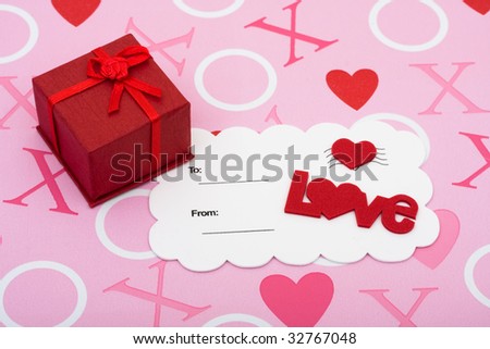 A pretty present with love postcard on a pink love background, happy valentines day