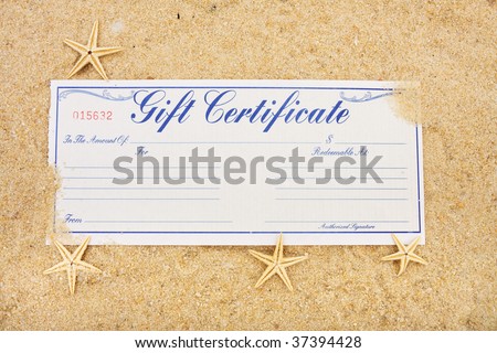 A gift certificate sitting on a beach with starfish, vacation gift certificate
