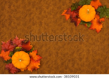Fall colored leaves making a border on a brown background, Fall Leaves