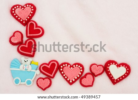 Red hearts making a  background with a baby carriage, Loving Parents