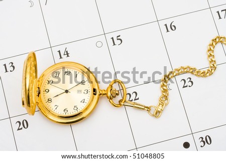 A gold pocket watch on a white calendar background, Time to retire