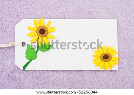 A blank tag with a sunflower on a purple background, blank gift tag