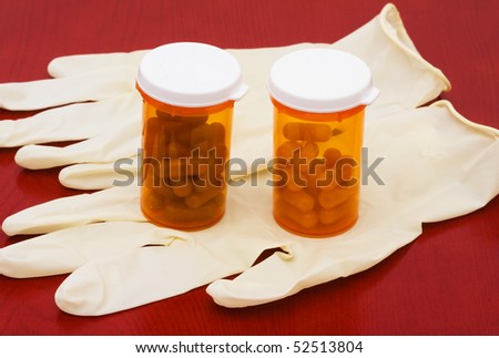 A bottle of medication on a wooden background, medical costs