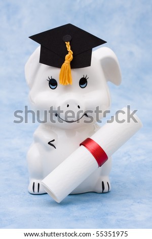 Piggy bank with graduation cap on a blue background, education savings