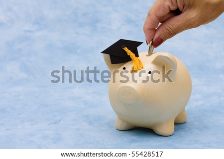 Piggy bank with graduation cap on a blue background, education savings