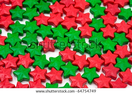 Red and green stars making a background isolated on white, star background