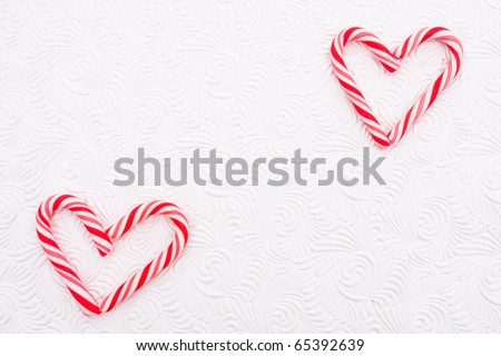 Two candy canes making a heart on a white background, Candy cane heart