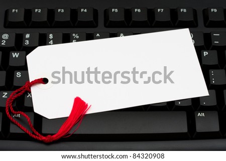 Computer keyboard with white gift tag with space for your message, Internet Shopping