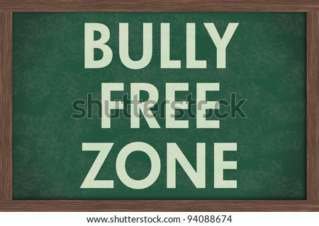 A chalkboard  with the chalk letters bully free zone, Bully Free Zone at schools